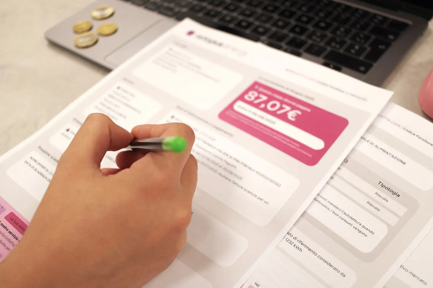 A funding application being reviewed with a pen